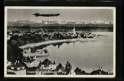 AK Friedrichshafen a. Bodensee, Zeppelin über dem Ort mit Kirche