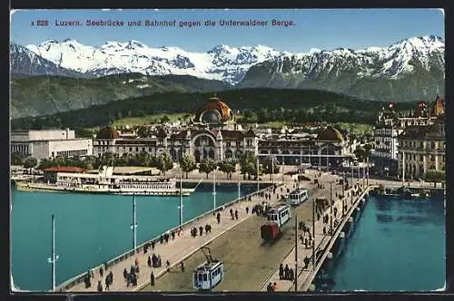 AK Luzern, Seebrücke und Bahnhof gegen die Unterwaldner Berge, Strassenbahn