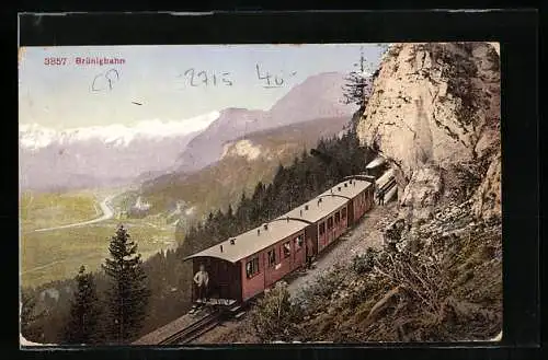 AK Brünigbahn, Bergbahn an Felswand mit Blick ins Tal