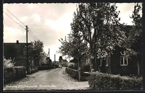 AK Ihrhove /Ostfriesland, Kirchstrasse mit blühenden Bäumen