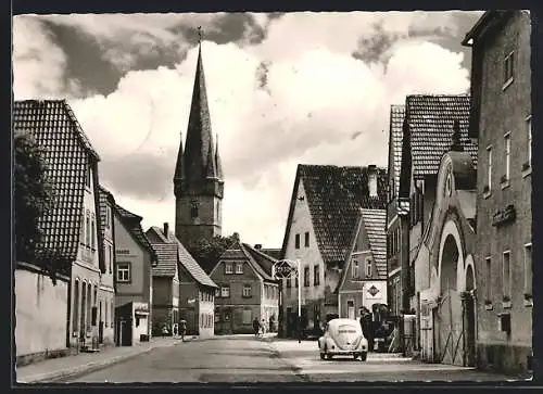 AK Baunach /Ufr., Hauptstrasse mit Tankstelle und Kirche