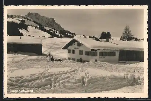 AK Jungholz bei Langenschwand /Tirol, Ortspartie mit Sportheim-Pension Doser im Winter