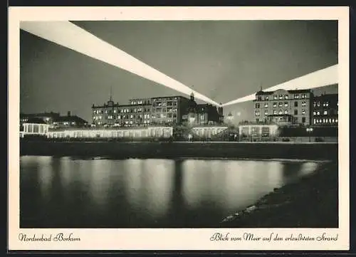 AK Borkum, Blick vom Meer auf den erleuchteten Strand