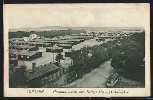 AK Giessen, Totalansicht des Kriegsgefangenenlagers, Strassenbahn