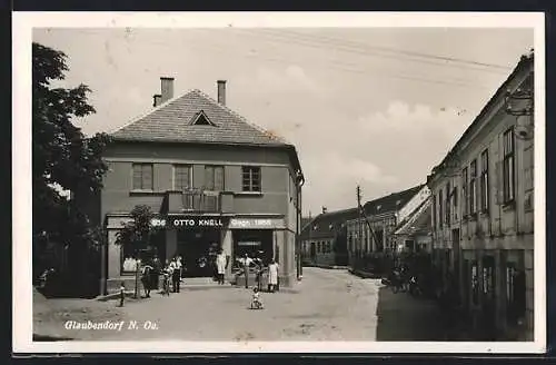 AK Glaubendorf /N. Oe., Strassenpartie mit Geschäftshaus Otto Knell