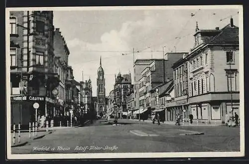 AK Krefeld a. Rh., Strasse mit Geschäften