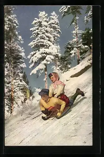 AK Ein junger Mann liegt auf dem Schlitten, seine Freundin sitzt auf ihm