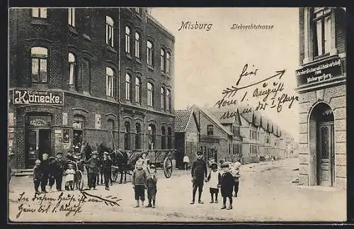 AK Misburg, Liebrechtstrasse mit Schrades Restaurant zum Misburgerberg u. Cigarrengeschäft Könecke, Leiterwagen, Kinder