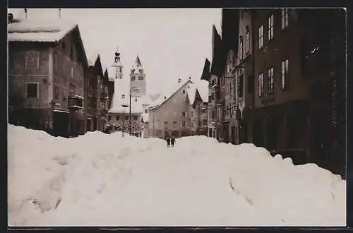 AK Kitzbühel, Ortspartie mit der Conditorei Praxmair im Winter