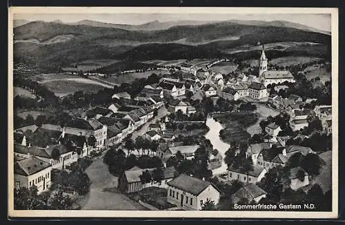 AK Gastern, Ortsansicht mit Kirche aus der Vogelschau