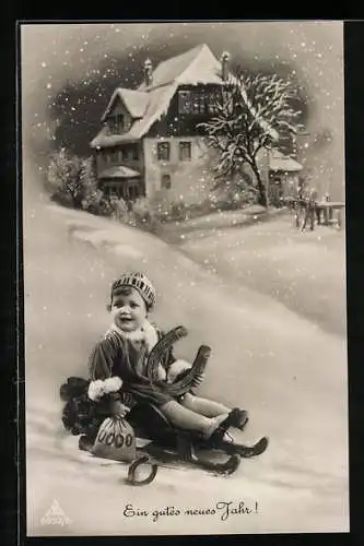 AK Kind mit Glücksbringern auf einem Rodelschlitten, Neujahrsgruss