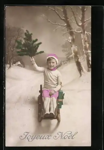 AK Kind mit Tannenstrauss auf einem Schlitten, Weihnachtsgruss
