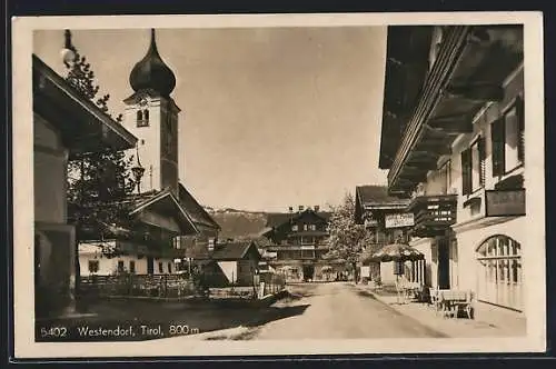 AK Westendorf, Ortspartie mit Gasthof Post und Kirche