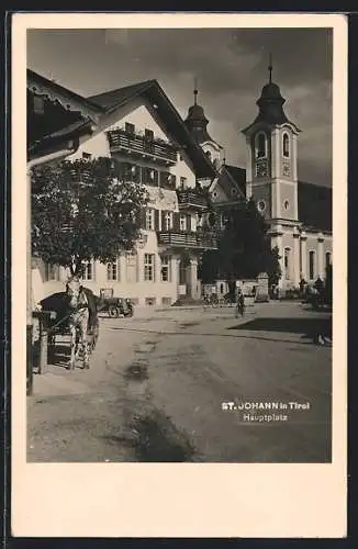 AK St. Johann in Tirol, Hauptplatz mit Kirche, Pferdefuhrwerk