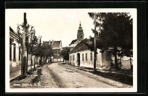AK Retzbach, Unter Retzbach, Strassenpartie mit Blick zur Kirche