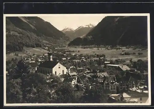 AK Schruns, Ortsansicht mit Bergen