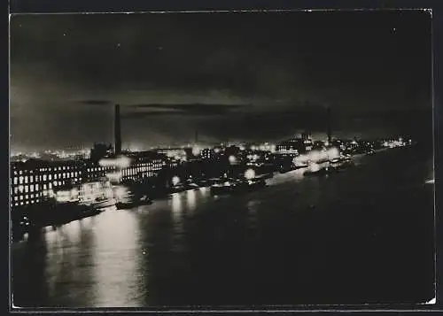 AK Ludwigshafen am Rhein, Schiffe am Flussufer bei Nacht