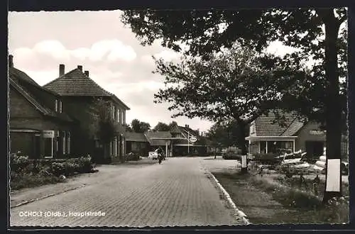 AK Ocholt /Oldb., Hauptstrasse mit Geschäft und Tankstelle