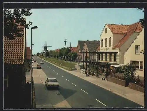 AK Carolinensiel, Strassenpartie mit Ferienwohnung und Windmühle