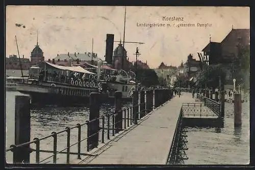 AK Konstanz, Landungs-Brücke mit abgehenden Dampfer