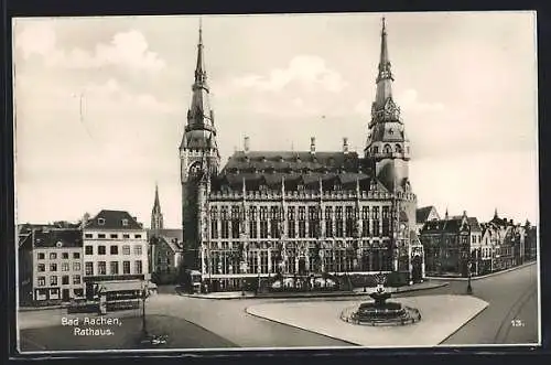 AK Bad Aachen, Rathaus mit Geschäft und Brunnen