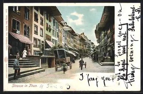 AK Thun, Strasse mit Geschäften und Häusern