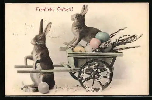 AK Osterhasen mit einer kleinen Karre und bunten Eiern