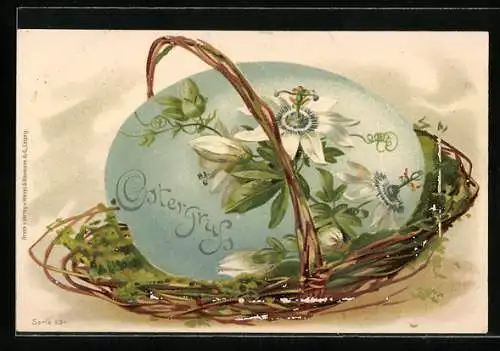 AK Ostergruss, buntes Ei mit Blumen geschmückt in einem Korb