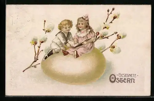 AK Kinder lesen zu Ostern ein Bilderbuch auf einem grossen bunten Ei