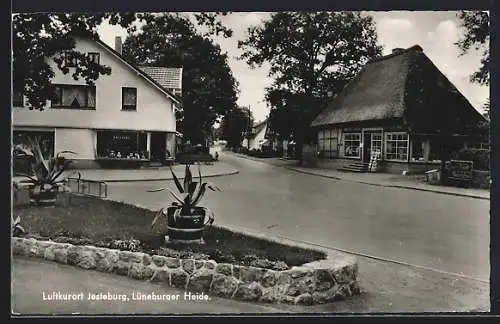 AK Jesteburg, Partie an der Bäckerei, Ladengeschäft mit Postkartenständer