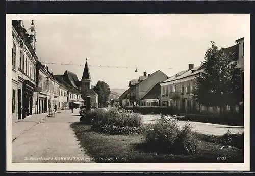 AK Rabenstein an der Pielach, Strassenpartie mit Geschäften und Kirche