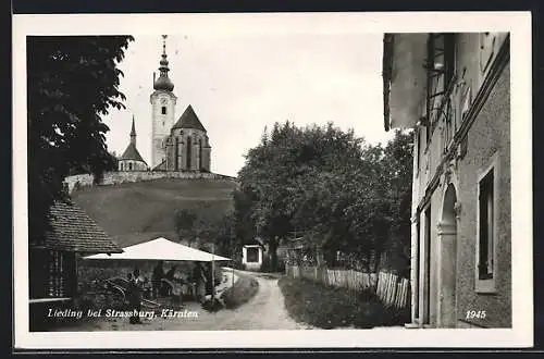 AK Strassburg /Kärnten, Lieding, Blick aus einer Strasse zur Kirche