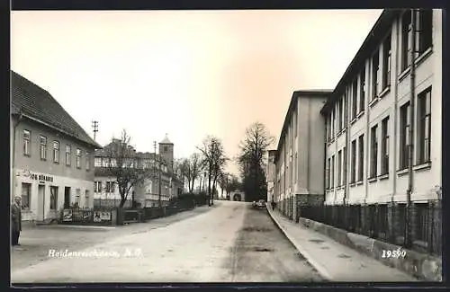 AK Heidenreichstein /N. Ö., Kaufmann Joh. Nöbauer, Strassenpartie