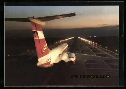 AK Flugzeug IL62 der Interflug auf der Startbahn in der Nacht