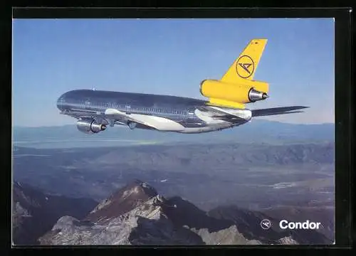 AK Flugzeug DC 10-30 von Condor über dem Gebirge