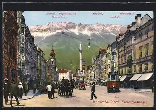 AK Innsbruck, Strassenbahn auf der Maria Theresienstrasse gegen die Alpen