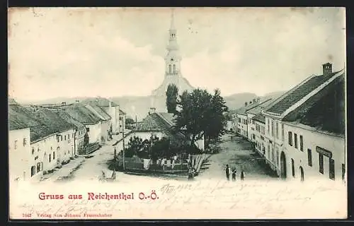 AK Reichenthal /O.-Ö., Strassenpartie mit Kirche