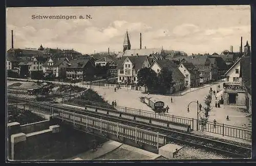 AK Schwenningen a. N., Strassenpartie mit Kirche