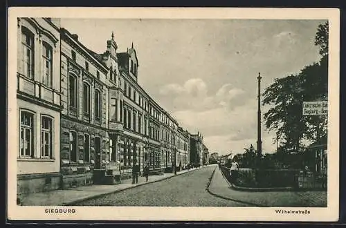 AK Siegburg, Wilhelmstrasse mit Passanten