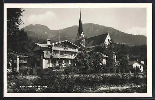 AK Bad Mehrn b. Brixlegg, Ortsansicht mit der Kirche gegen die Berge