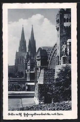 AK Köln a. Rh., Hohenzollernbrücke mit Dom