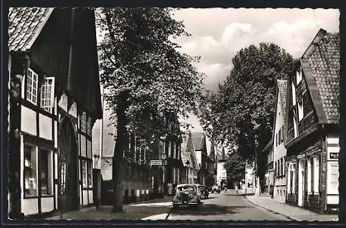 AK Gütersloh, Münsterstrasse mit Geschäften