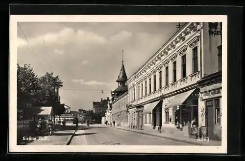 AK Wien, Liesing, Strassenpartie mit Hotel und Restaurant