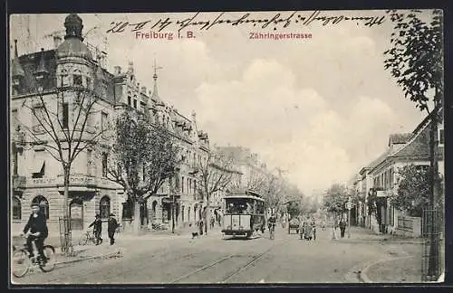AK Freiburg i. B., Zähringerstrasse mit Restaurant zum Löwen mit Strassenbahn