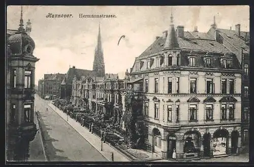 AK Hannover, Hermannstrasse mit Geschäft und Kirche