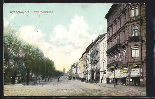 AK Wiesbaden, Rheinstrasse mit Geschäften, Strassenbahn