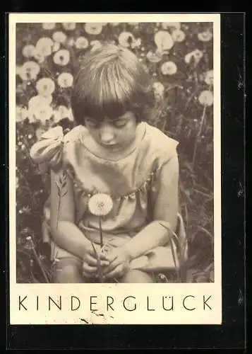 AK Ev. Jugendhilfe Pforzheim, Mädchen auf einer Pusteblumenwiese