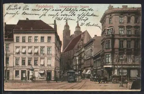 AK Magdeburg, Johannesberger Strasse mit Strassenbahn und Kirchtürmen