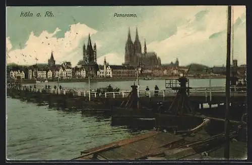 AK Köln a. Rh., Panorama mit Hafenanlagen und Brücke