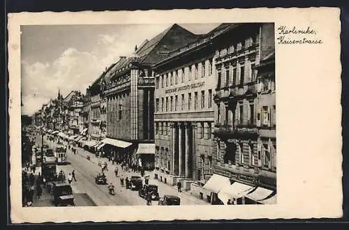AK Karlsruhe, Kaiserstrasse mit Geschäften und Strassenbahn
